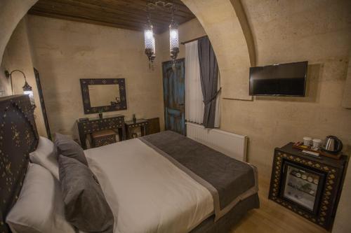Televisyen dan/atau pusat hiburan di Sinasos Star Hotel Cappadocia