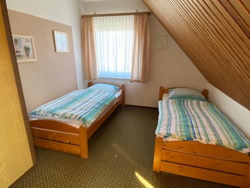 Postel nebo postele na pokoji v ubytování STOE3 Ferienwohnung Waack