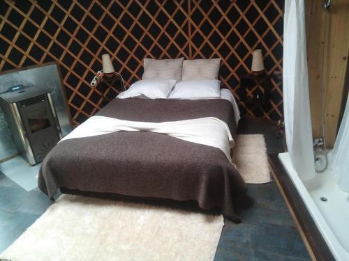 Un ou plusieurs lits dans un hébergement de l'établissement Vale do Rossim Eco Resort