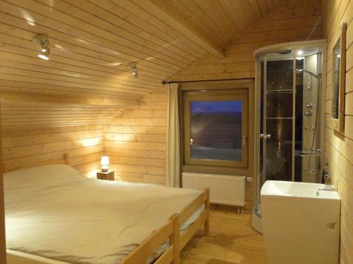 Holiday Home A Pas de Loup tesisinde bir odada yatak veya yataklar