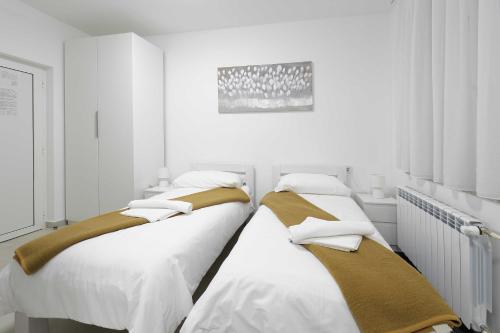 Postel nebo postele na pokoji v ubytování Rooms Studentsko Naselje Ivan Goran Kovačić