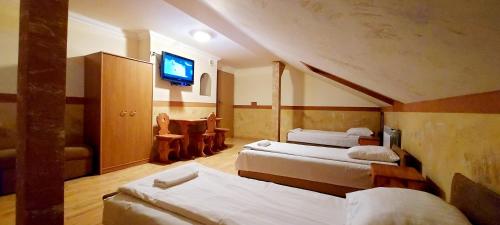 Posteľ alebo postele v izbe v ubytovaní Motel Panorama