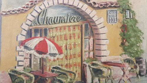 a painting of a store door with an umbrella at La chaumiere in Seyne