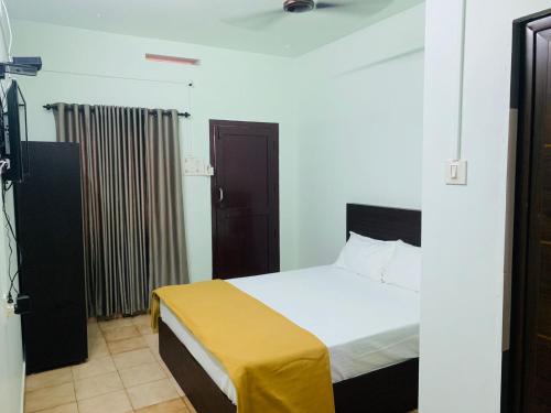 Cama o camas de una habitación en Apsara Residency