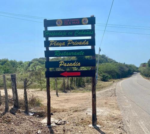 a street sign on the side of a road at Club Camping Islamar in Baru
