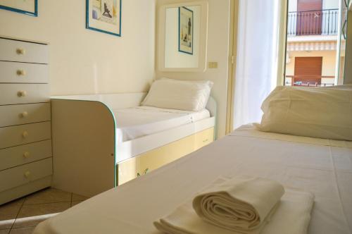 Voodi või voodid majutusasutuse Homiday - Villino Saranda toas