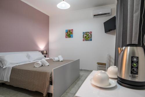 Katil atau katil-katil dalam bilik di Ada Hotel