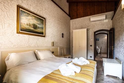 Postel nebo postele na pokoji v ubytování Residenza I Gioielli