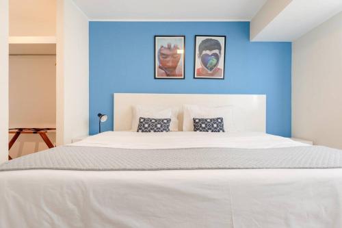 Una cama o camas en una habitación de Trendy Host Stelar Miraflores