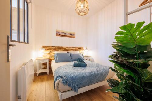 Ένα ή περισσότερα κρεβάτια σε δωμάτιο στο Woods Natural Hyper centre Fontaine Moussue