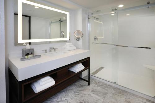 a bathroom with a sink and a shower at Bally's Atlantic City Hotel & Casino in Atlantic City
