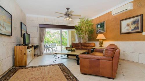 a living room with a couch and a table at Ocean Dream in Cabarete