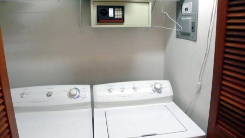 a white washer and dryer in a small room at Ocean Dream in Cabarete