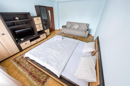 Voodi või voodid majutusasutuse Apartment оn Makatayeva 5 b toas