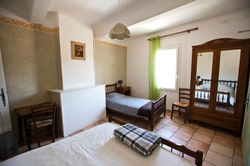 Postel nebo postele na pokoji v ubytování Hôtel de la Place