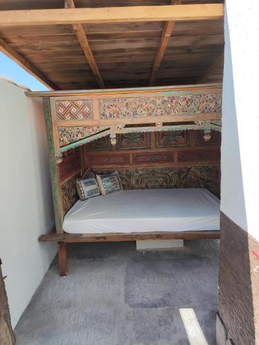 Giường trong phòng chung tại Villa Bali con jacuzzi climatizado y piscina climatizada con jacuzzi