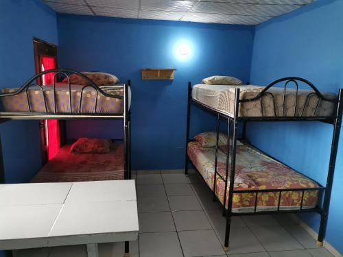 Postel nebo postele na pokoji v ubytování Chambres en Ville