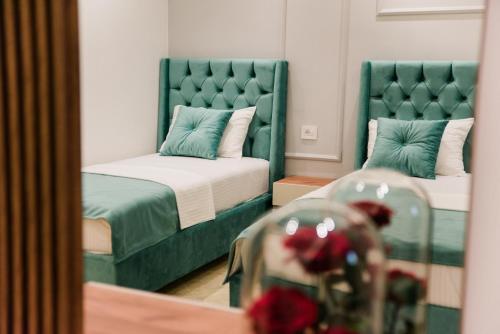 Postel nebo postele na pokoji v ubytování Apartments Casa Mia