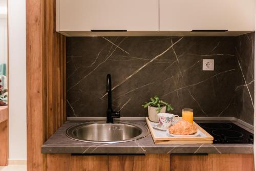 Kuchyň nebo kuchyňský kout v ubytování Apartments Casa Mia