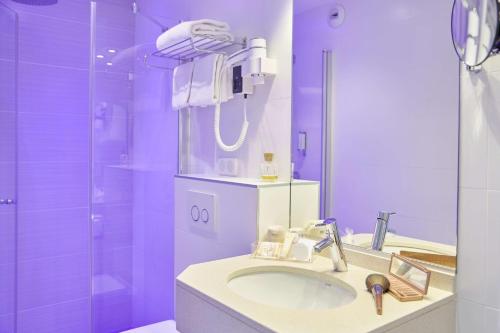 Koupelna v ubytování Best Western Plus Hotel Carlton Annecy