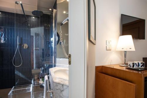 Um banheiro em Dal Moro Gallery Hotel
