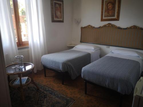 Postel nebo postele na pokoji v ubytování Casa vancanza Sciamandola