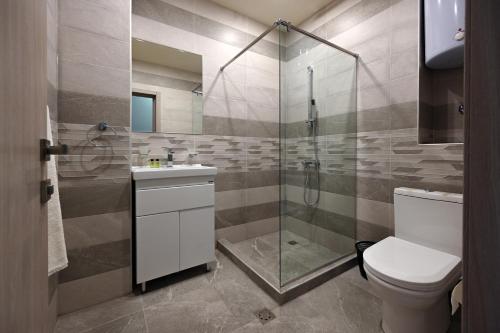 Ванна кімната в Forest Apartments Hotel