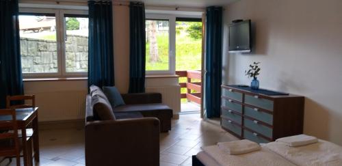 Χώρος καθιστικού στο Apartament Holny