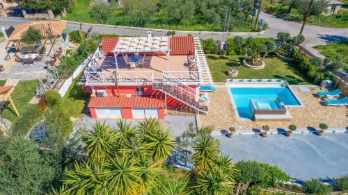 an aerial view of a resort with a swimming pool at Dorothea Villa in Zakynthos Town