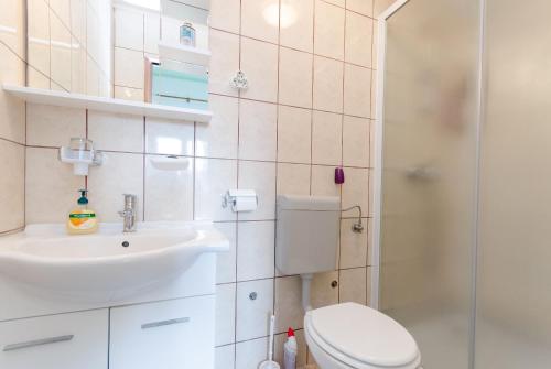 Koupelna v ubytování Apartments Mijatovic