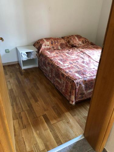 Postel nebo postele na pokoji v ubytování Street View Apartman