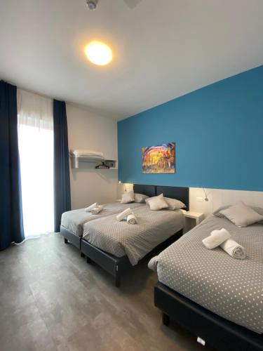 Katil atau katil-katil dalam bilik di Hotel Aurora & Appartamenti