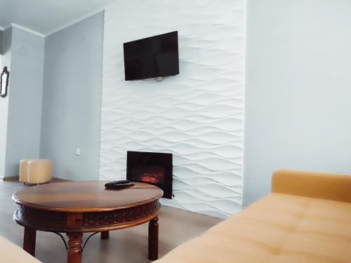 TV a/nebo společenská místnost v ubytování Milmar apartman