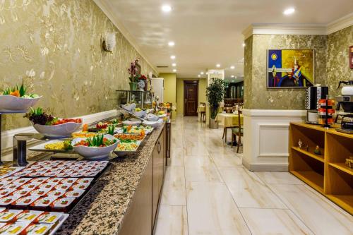 a buffet line in a hotel with food on it at Golden Crown Hotel in Istanbul