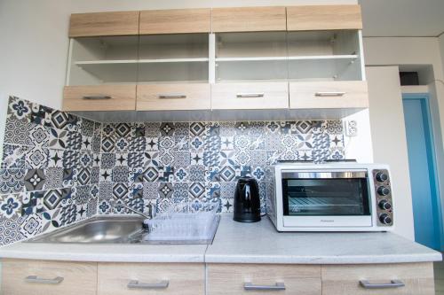 Η κουζίνα ή μικρή κουζίνα στο CHAMBRE BLANCHE