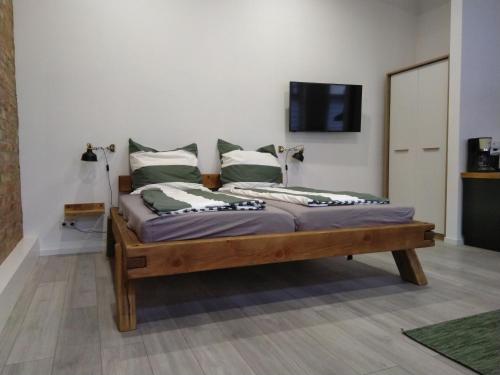 Voodi või voodid majutusasutuse Ferienwohnungen Ribnitz-Damgarten (FR) toas