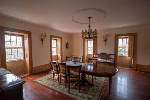 a dining room with a table and chairs at Quinta Do Bento Novo - Casa de Campo - Turismo Rural in Viana do Castelo