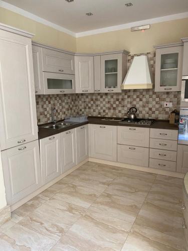 Cuisine ou kitchenette dans l'établissement Magical Casalgo House