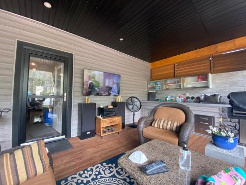 a living room with a couch and a table at Stay549 in Winnipeg