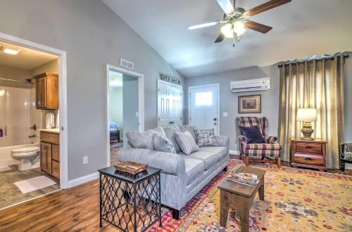 a living room with a couch and a table at Pet-Friendly Brownsville Retreat with Porch! in Sloans Crossing