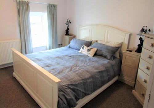 Postel nebo postele na pokoji v ubytování Anchor Cottage