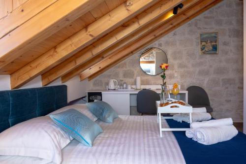מיטה או מיטות בחדר ב-Luxury Rooms Rustic Chic