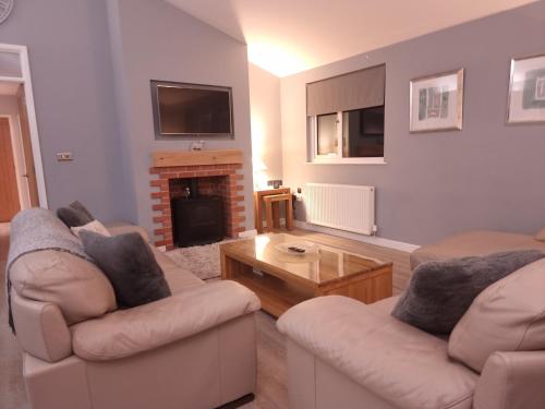 Χώρος καθιστικού στο Serenity Lodge Otterburn