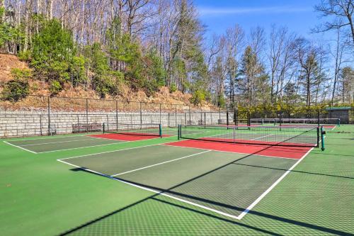 two tennis courts on a tennis court at Amazing A-Frame with Private Hiking and Amenities in Brevard