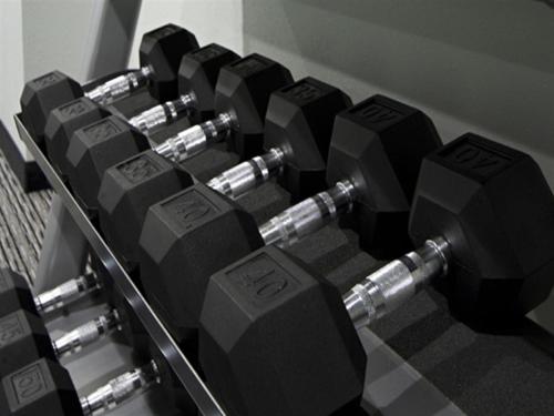 a row of dumbbells lined up in a gym at The Wallhouse Hotel, an Ascend Collection Hotel in Walnut Creek