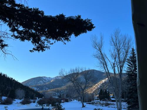 a view of the mountains in the snow at Mountain View Lodge in Red River