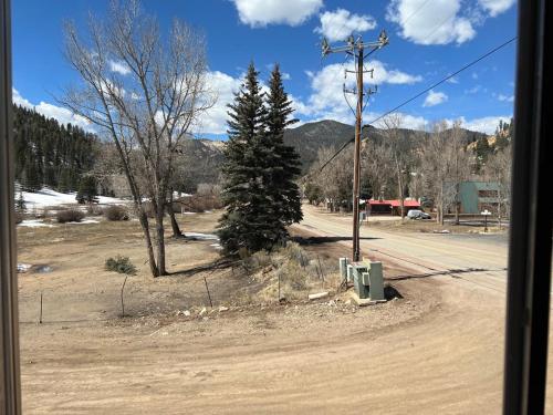 a view of a road with a telephone pole at Mountain View Lodge in Red River