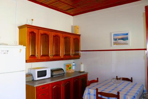 Kuchyň nebo kuchyňský kout v ubytování Casa Família Agostinho - Ericeira