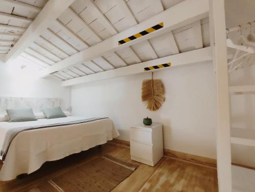 Ένα ή περισσότερα κρεβάτια σε δωμάτιο στο Casa Telégrafos
