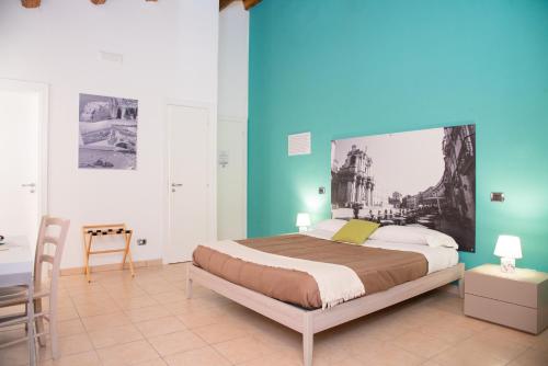Postel nebo postele na pokoji v ubytování B&B Vicolo IV